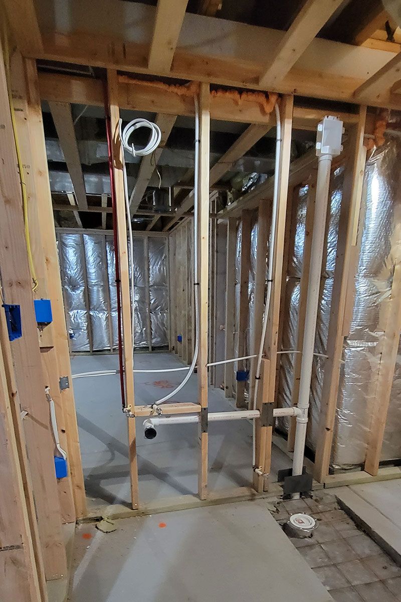Basement plumbing rough in and installing plumbing in existing concrete slabs